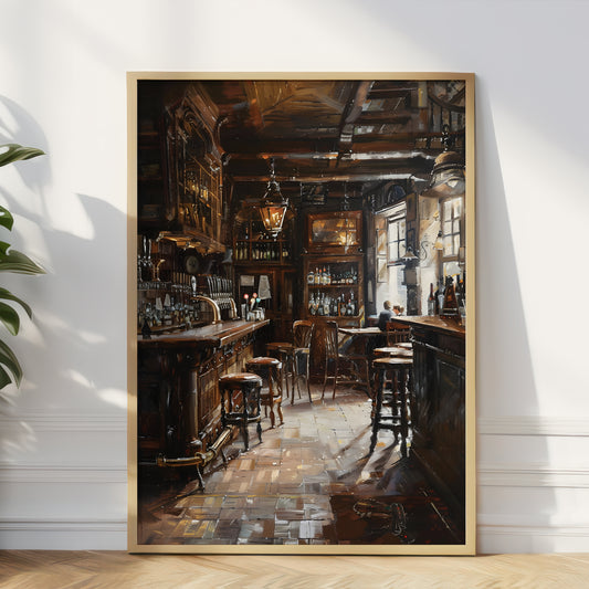 A large framed vertical art print depicting a detailed, atmospheric pub interior with wooden bar counters, stools, shelves, and warm hanging lights, leaning against a white wall on a light wood floor.
