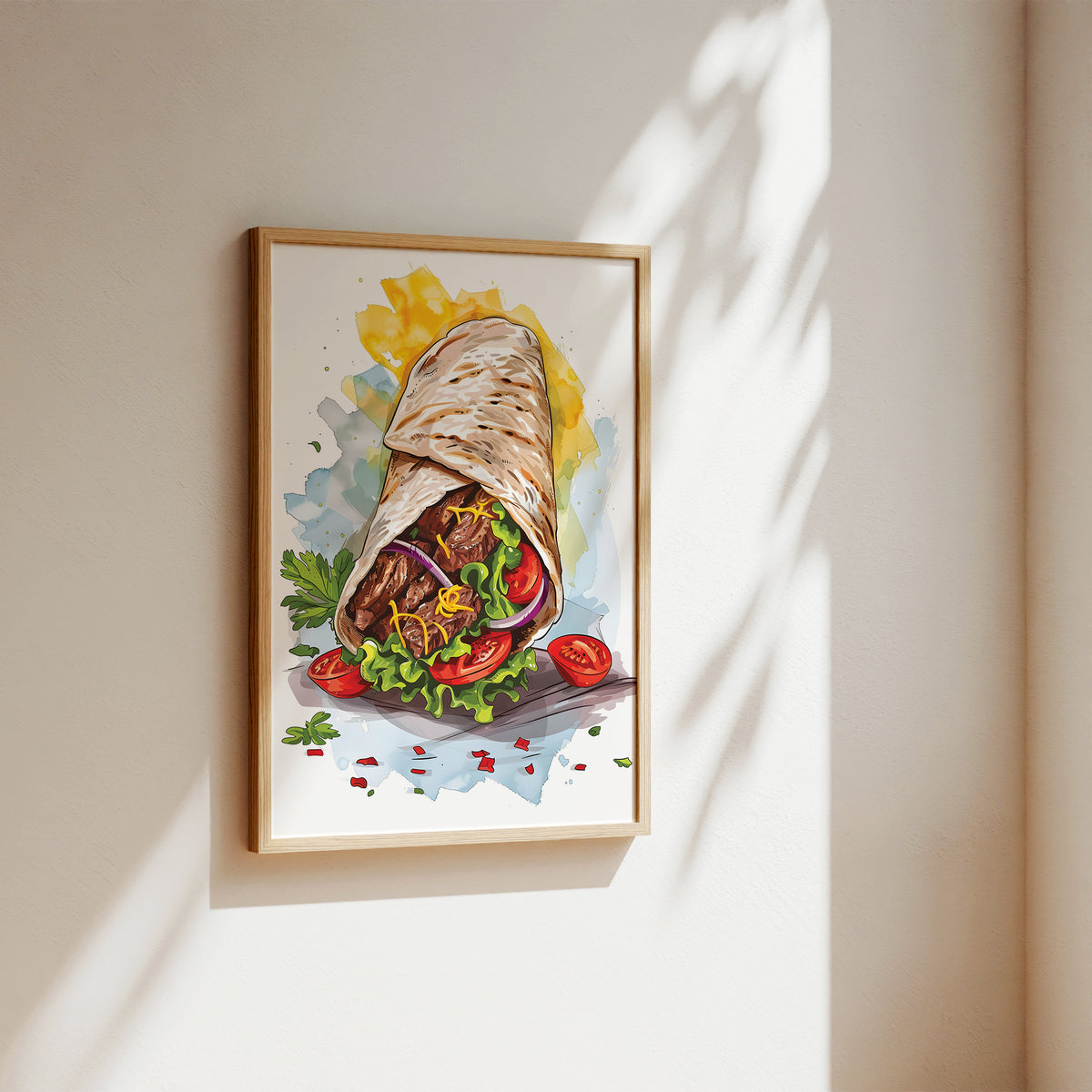 A framed watercolor painting of a gourmet wrap or burrito with lettuce, tomatoes, and red onion, displayed on a warm beige wall with soft sunlight and leaf shadows.