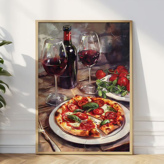 A framed still life art print depicting a pizza, two glasses of red wine, a wine bottle, and fresh tomatoes and basil, leaning against a white wall on a light wood floor.