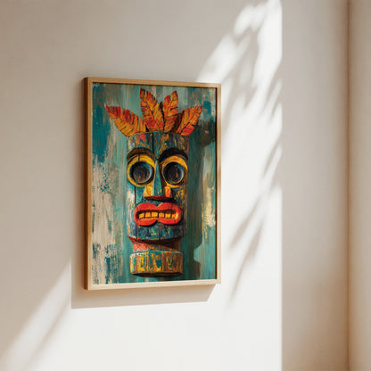 A framed colorful tiki-style wall art piece hanging on a warm off-white wall, with sunlight casting leaf shadows across the surface.