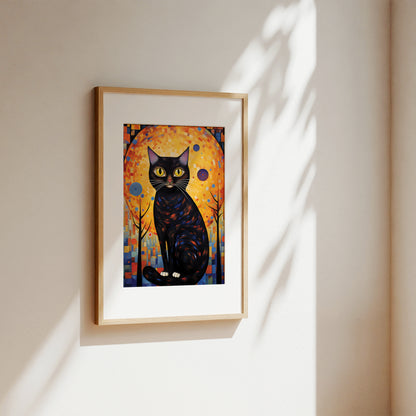 A framed art print featuring a stylized black cat in front of a glowing orange and yellow background, hung on a beige wall with soft sunlight and leaf shadows.