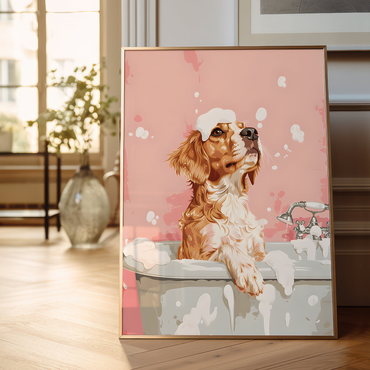 A framed art print depicting a brown and white dog with soap bubbles on its head sitting in a bathtub, leaning against a wall on a wooden floor in a softly lit room.