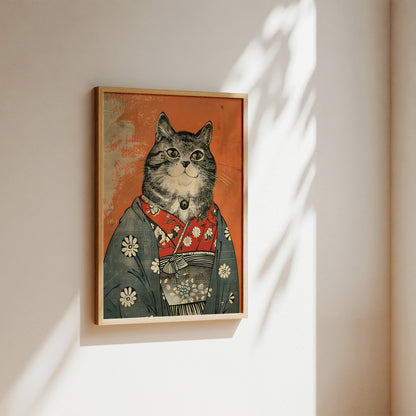 A framed art print featuring a stylized cat in a Japanese kimono, hanging on a warm beige wall with soft diagonal sunlight and leaf shadows.