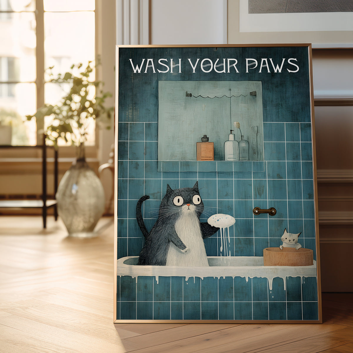 Poster with cartoon cats in a bathroom and 'Wash Your Paws' text, displayed in a room.