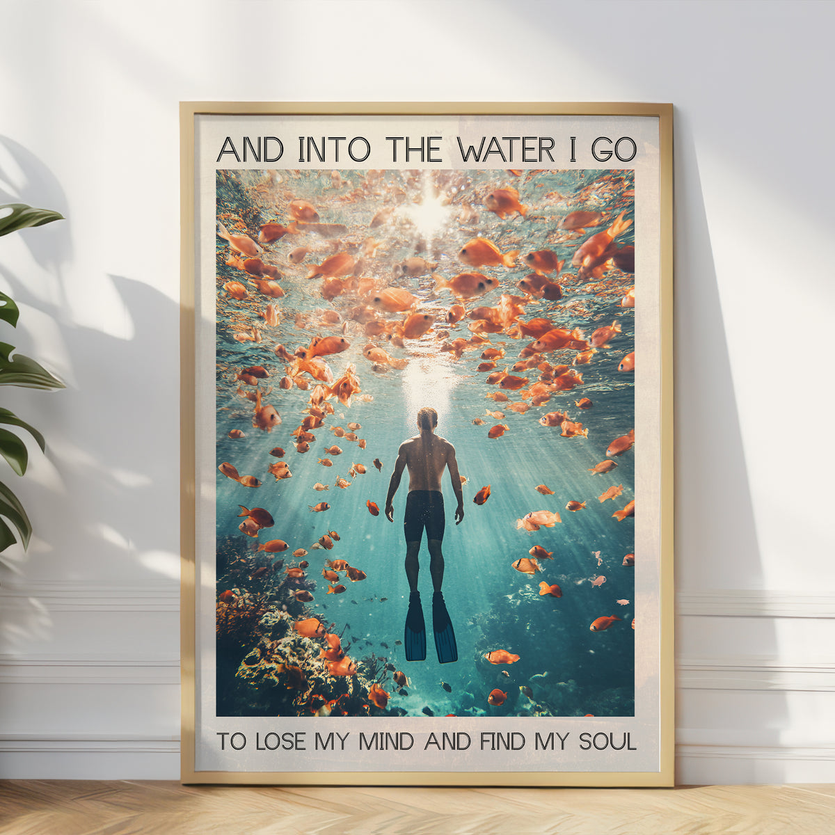 underwater ocean and person underwater with many golden fish around with quote wall art print