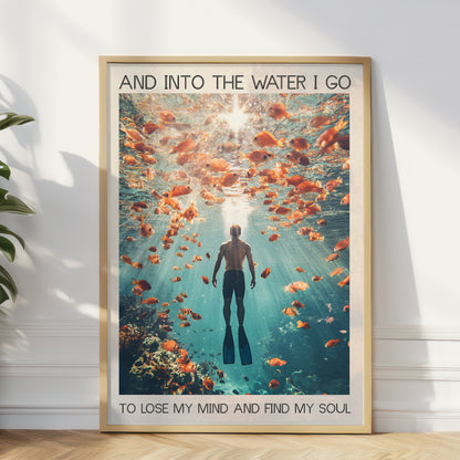 underwater ocean and person underwater with many golden fish around with quote wall art print