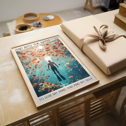 underwater ocean and person underwater with many golden fish around with quote wall art print