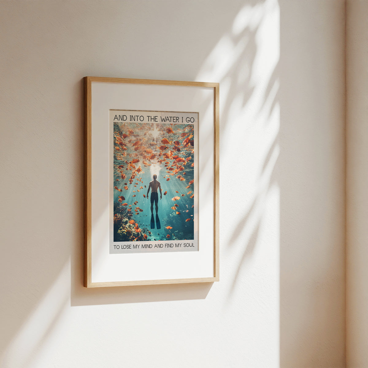 underwater ocean and person underwater with many golden fish around with quote wall art print