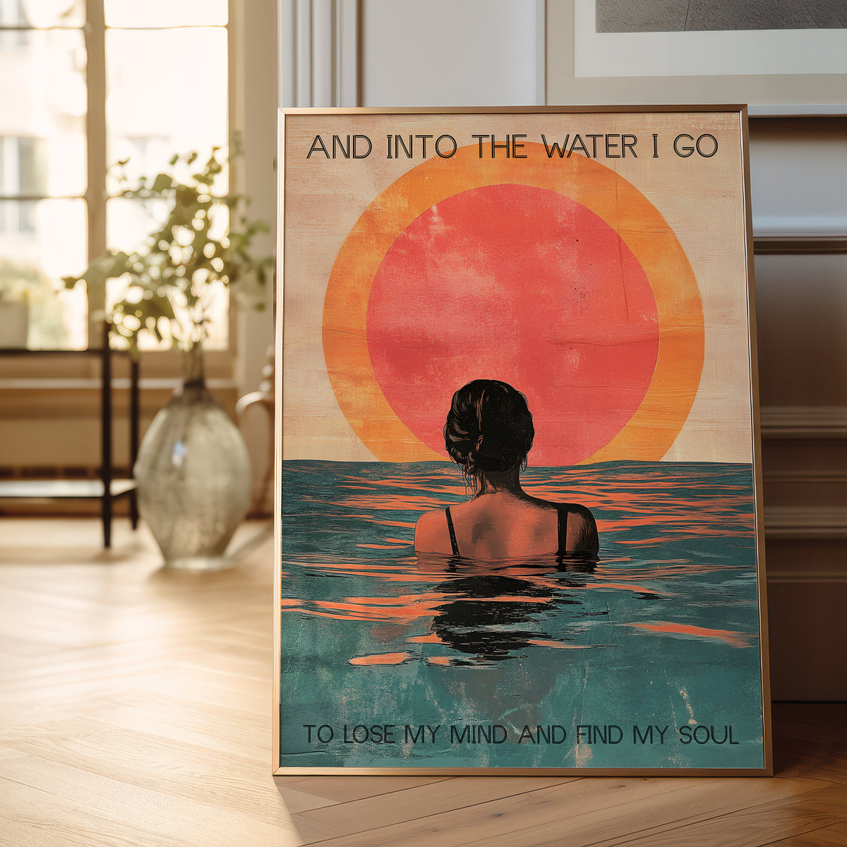 Poster of a woman in water with a sunset and text in a room.