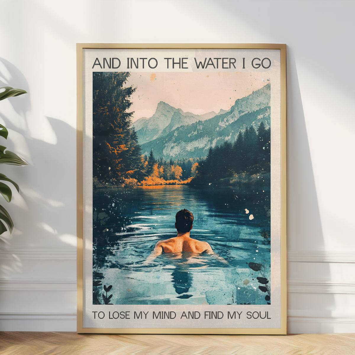 Framed artwork of a person in a lake with mountains and text on a wall.