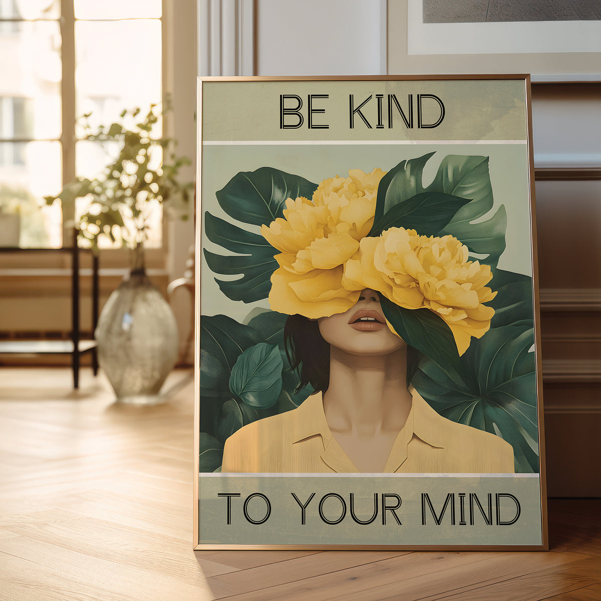 Poster with a woman's face covered by yellow flowers and green leaves, with text 'Be kind to your mind' in a room.