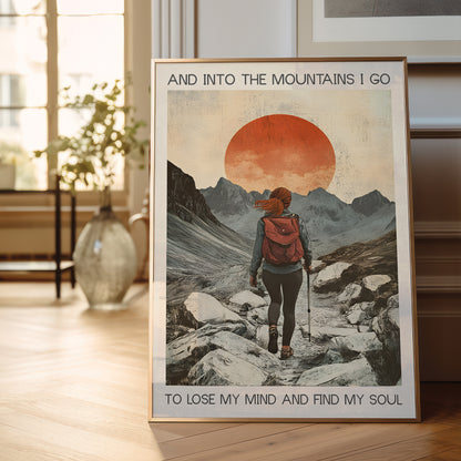 Framed poster of a person hiking with mountains and sunset in a room.