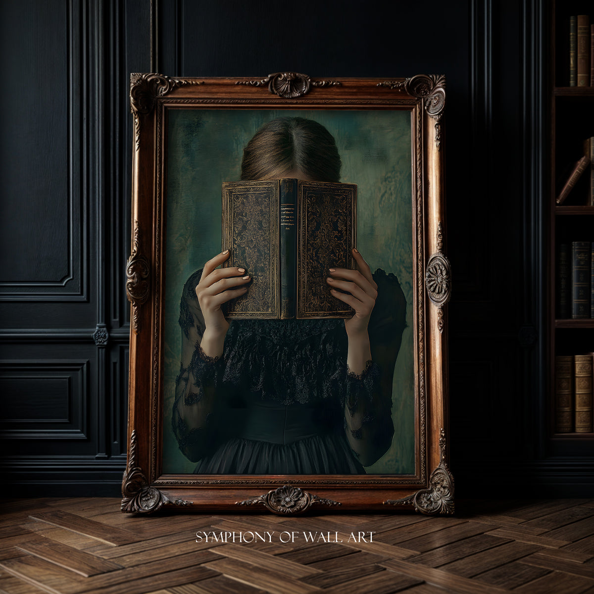 Framed artwork of a woman holding an old book in front of her face against a dark wall.