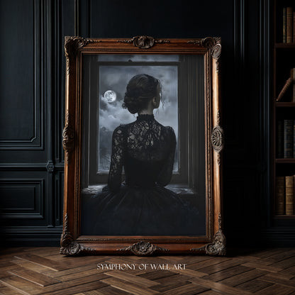 Framed artwork of a woman in a dark dress looking out a window with a full moon, in a room with dark walls and wooden floor.