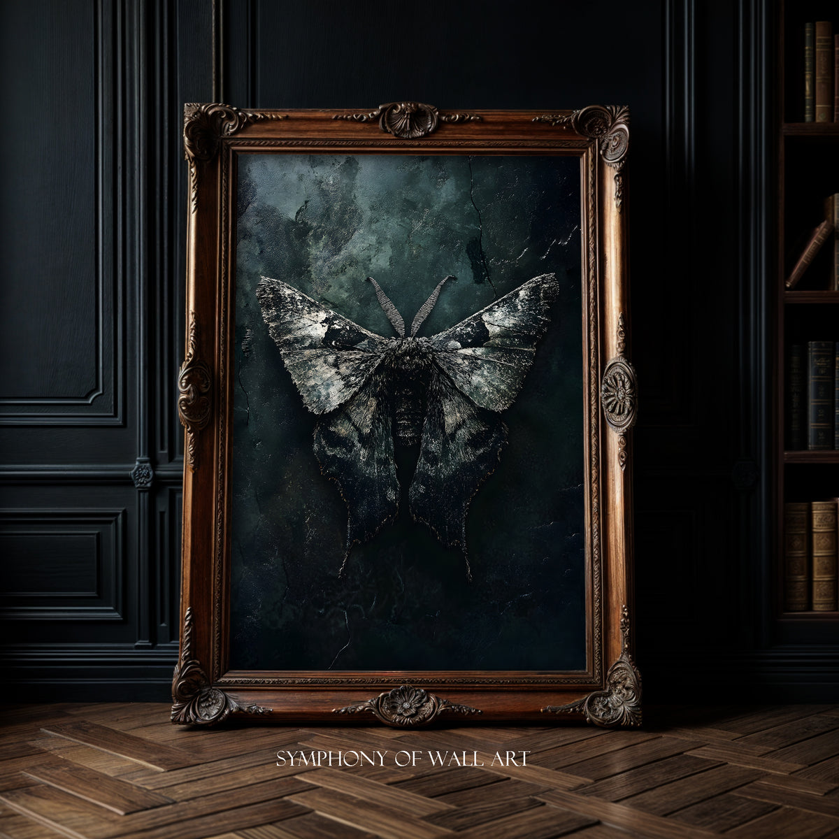 Framed artwork of a butterfly on a dark background in a room with wooden floor and bookshelf.