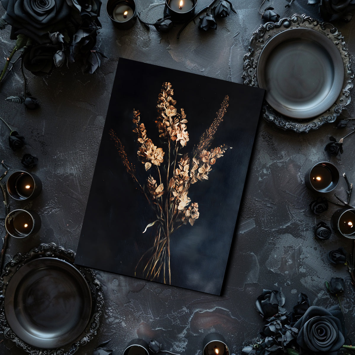 Dark table setting with a floral arrangement on a black card, surrounded by candles and decorative elements.