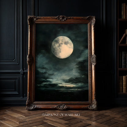 Framed artwork of a moonlit sky with clouds in a dark room.