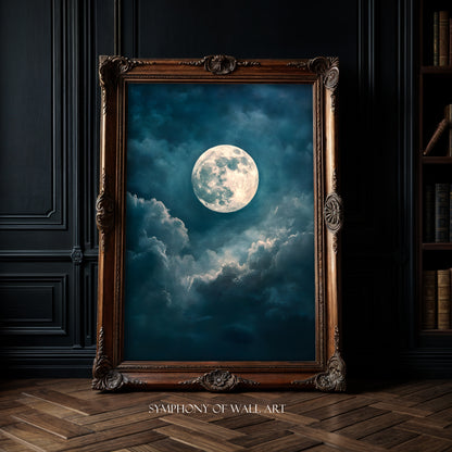 Framed artwork of a moonlit sky with clouds in a dark room.
