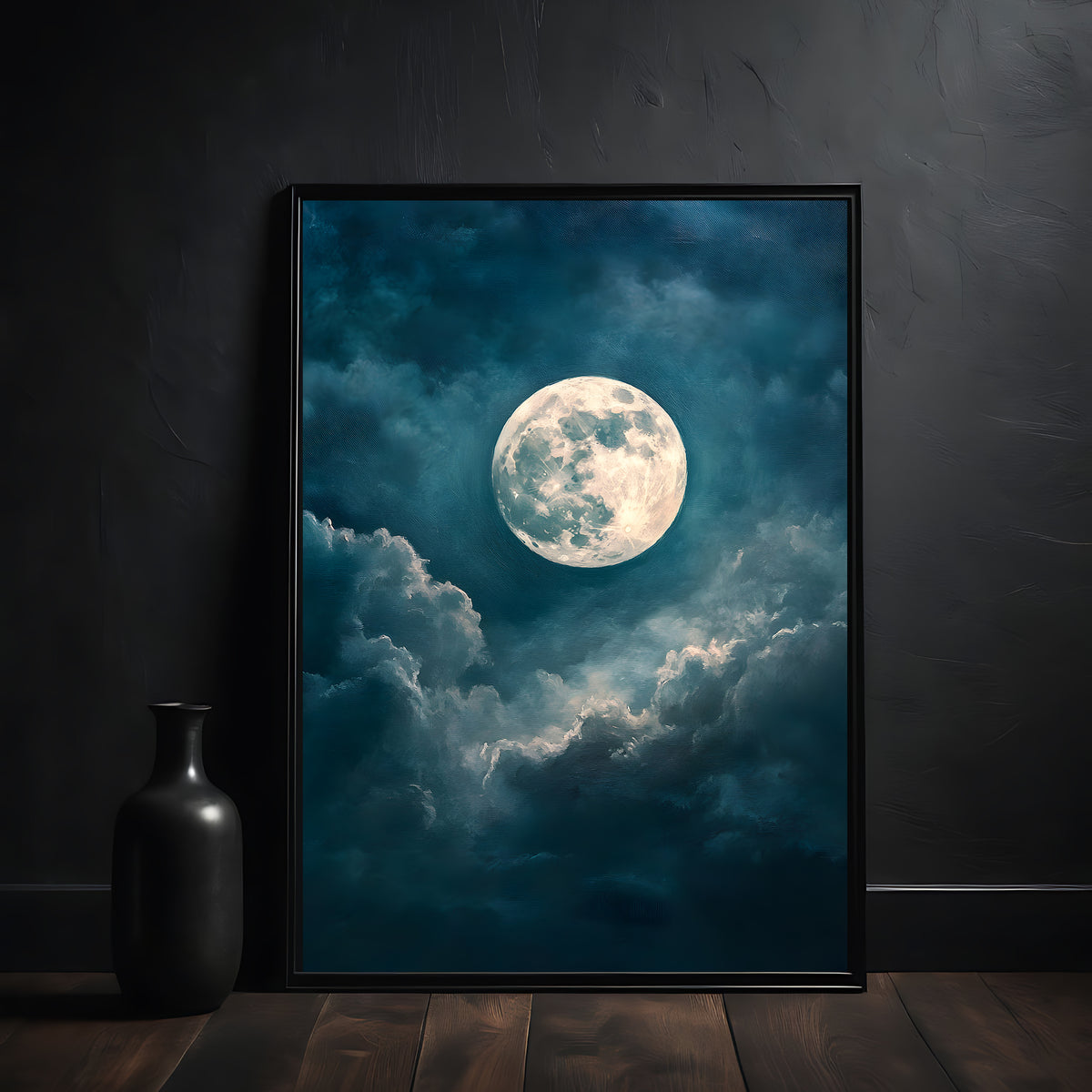 Framed artwork of a moonlit sky with clouds on a dark wall.