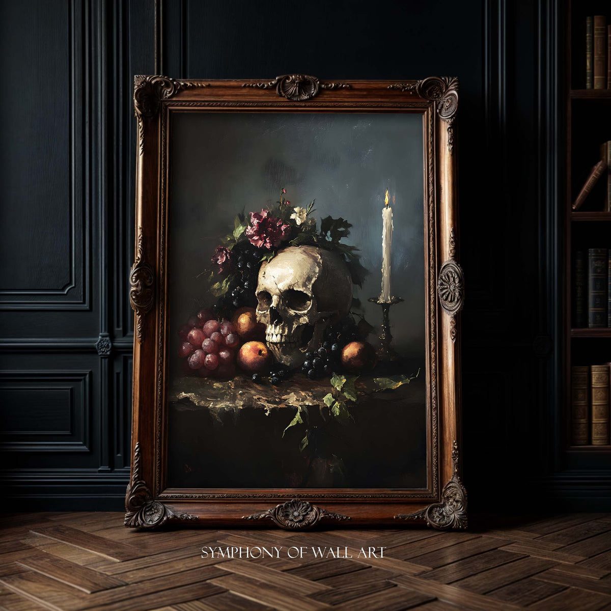 Framed painting of a skull with fruit and a candle on a dark background, displayed in a room with wooden floor and bookshelf.