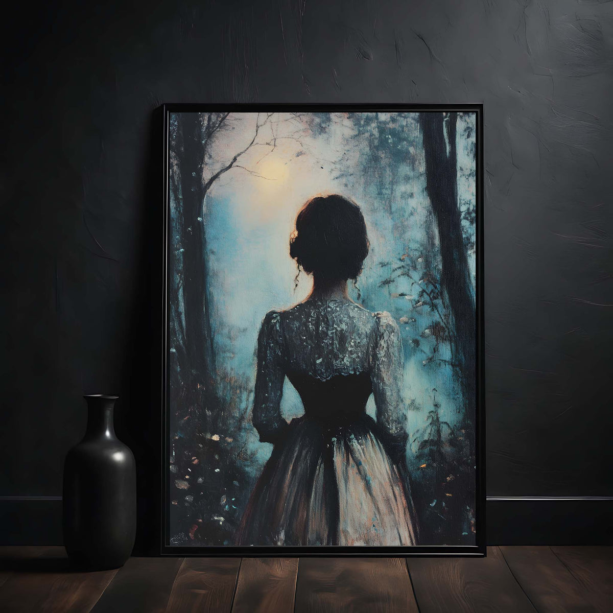 Framed artwork of a silhouette of a woman in a forest against a dark wall.