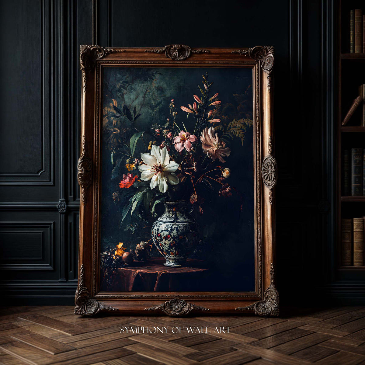Decorative painting of flowers in a vase within an ornate wooden frame, displayed in a room with dark walls and wooden floor.
