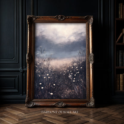 Framed artwork of a landscape with flowers on a dark wall.