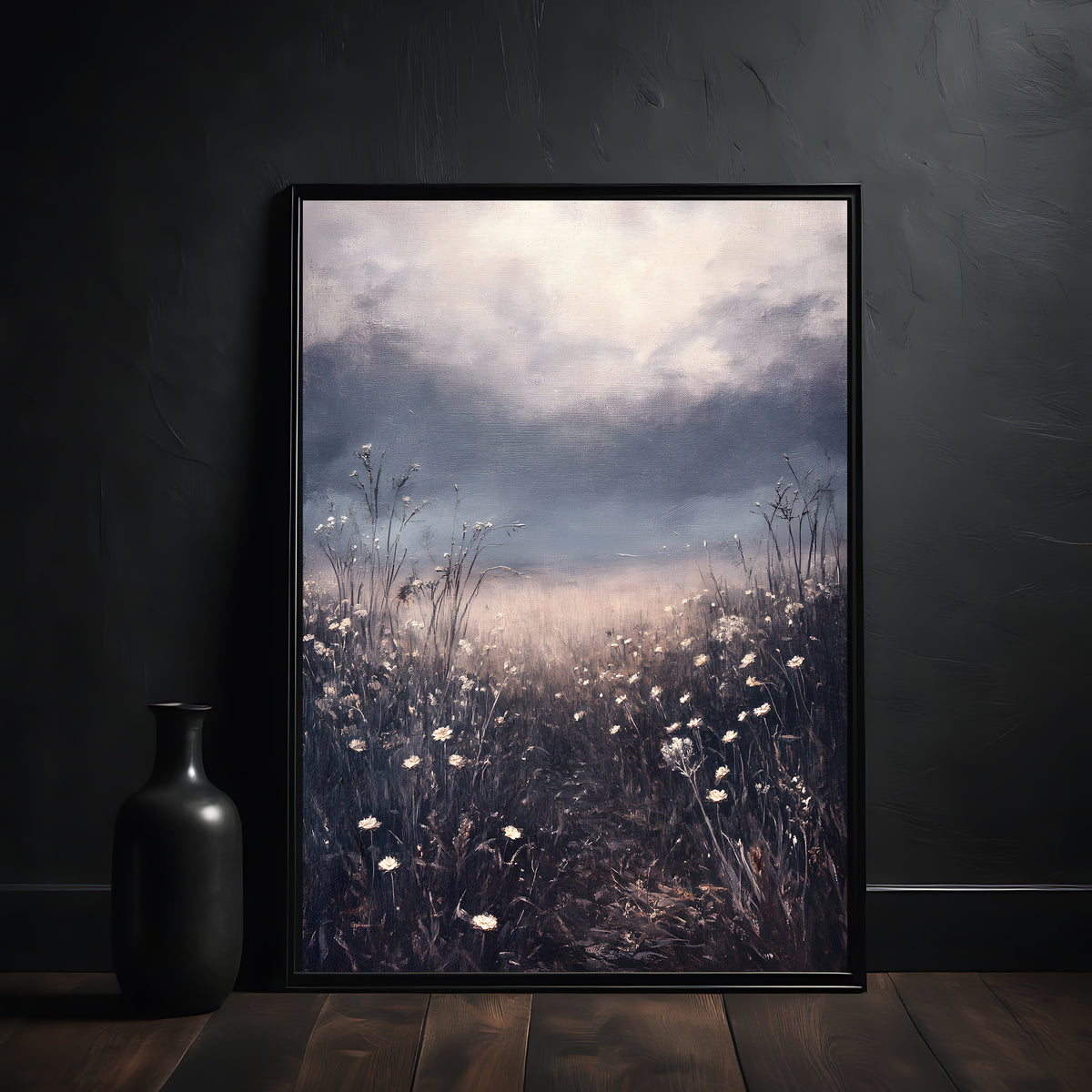 Framed artwork of a field with flowers and clouds on a dark wall.