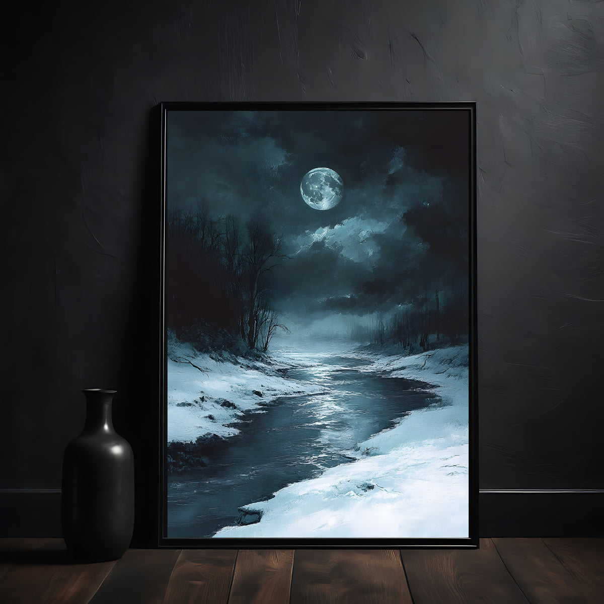 Framed artwork of a moonlit snowy landscape on a dark wall.