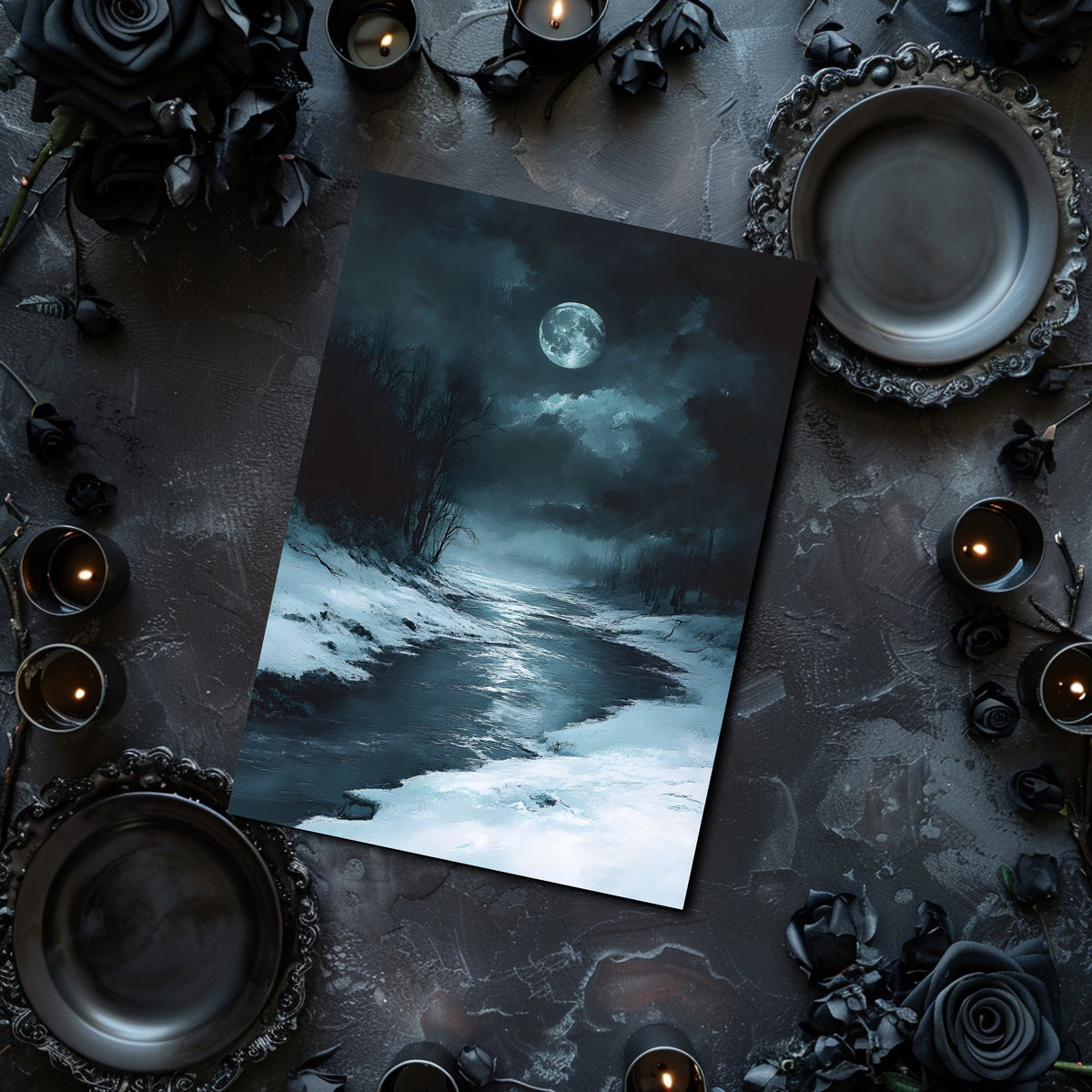 Art print of a moonlit landscape on a dark surface with candles and decorative elements.