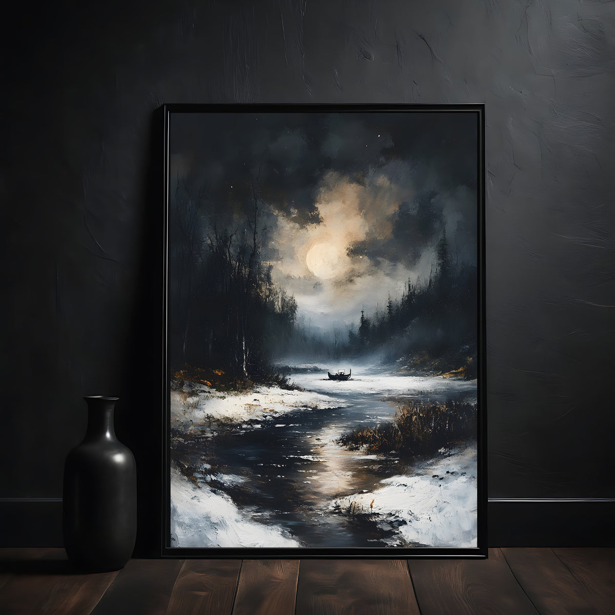 Framed painting of a snowy landscape with a dark frame on a dark wall.